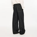 KREATE Asymmetric Button-Up Pleated Jeans