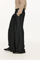 KREATE Asymmetric Button-Up Pleated Jeans