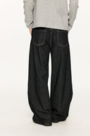 KREATE Asymmetric Button-Up Pleated Jeans