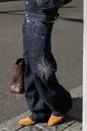 STEEPC Firework Embroidered Rhinestone Curved Raw Jeans