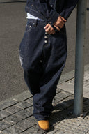 STEEPC Firework Embroidered Rhinestone Curved Raw Jeans